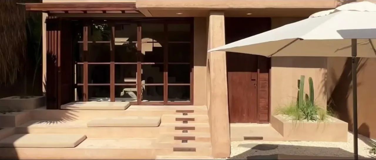 Video ad still, villa exterior